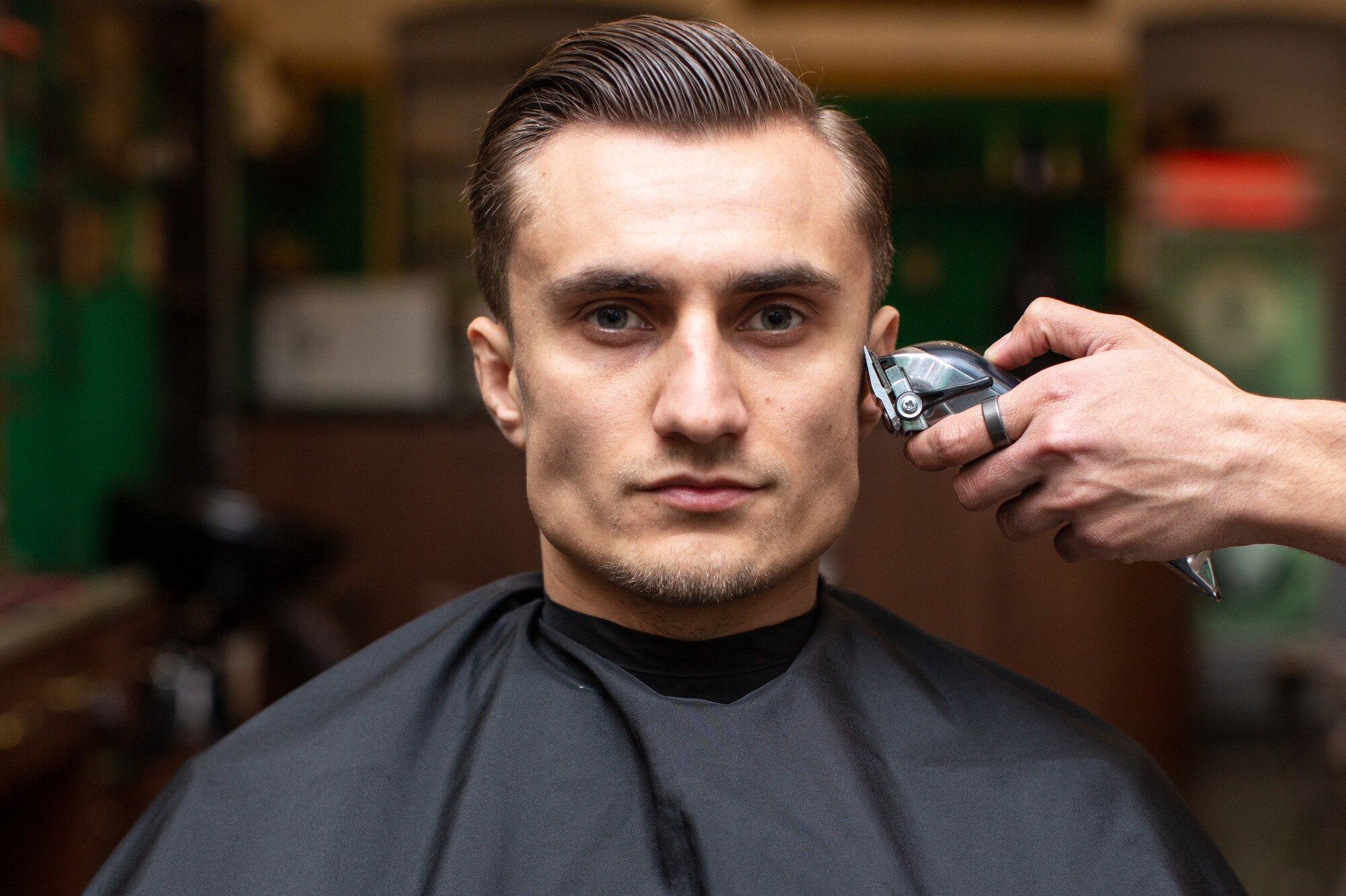barber makes haircut 140725 7893