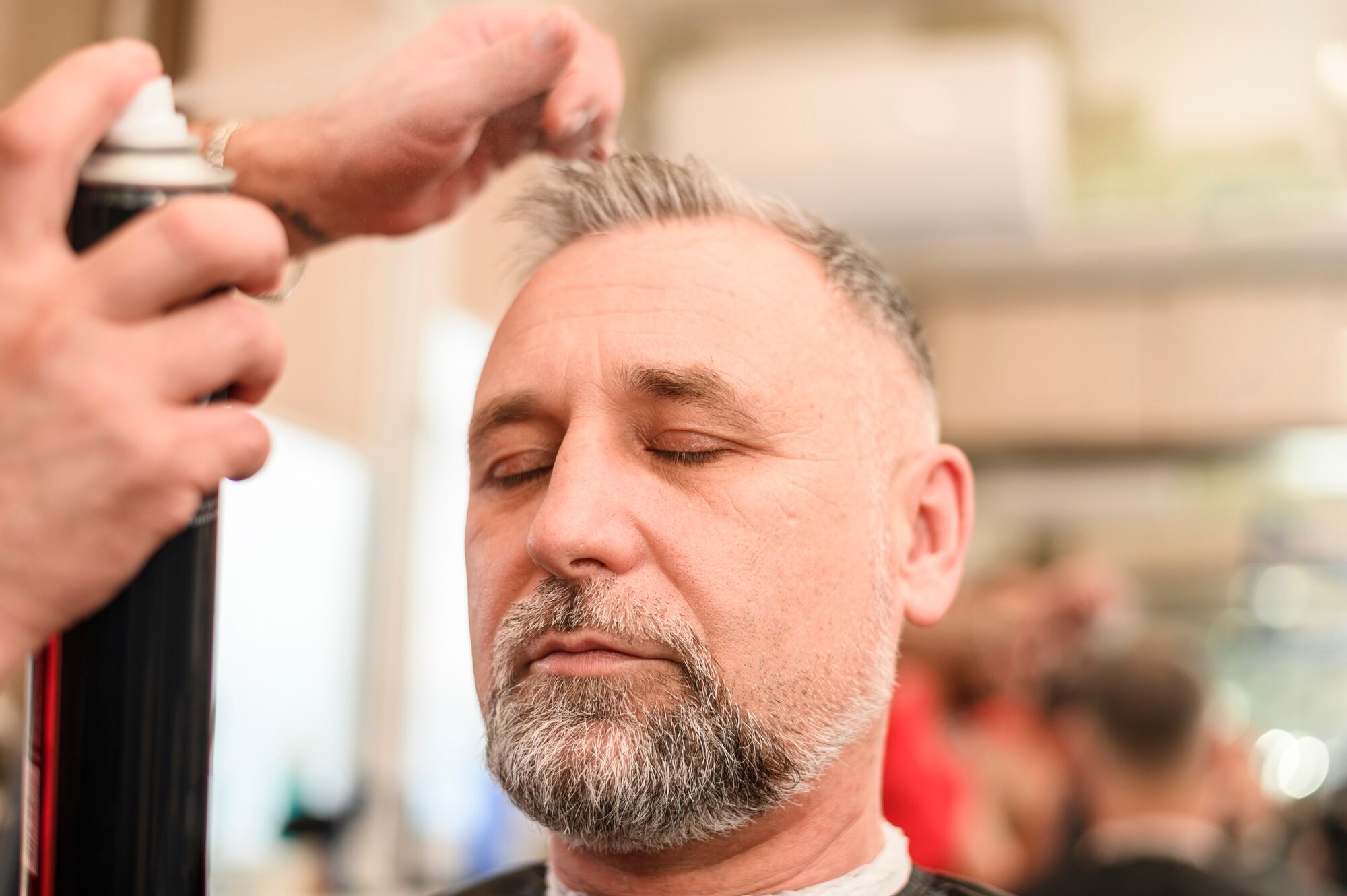man getting his hairstyle done 23 2148465240