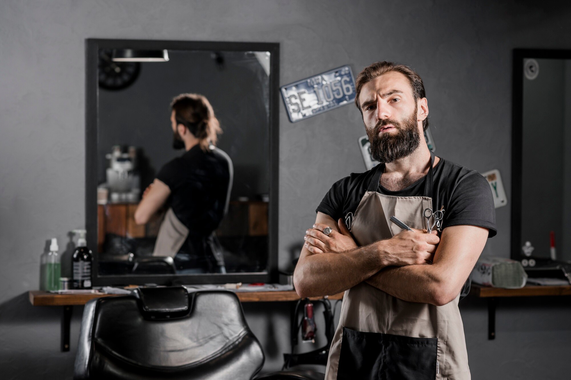 portrait male hairstylist with folded arms 23 2147839827